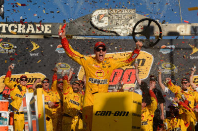 AVONDALE, AZ - NOVEMBER 13: Joey Logano, driver of the #22 Shell Pennzoil Ford, celebrates in Victory Lane after winning the NASCAR Sprint Cup Series Can-Am 500 at Phoenix International Raceway on November 13, 2016 in Avondale, Arizona. (Photo by Robert Laberge/NASCAR via Getty Images)