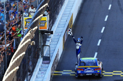 MARTINSVILLE, VA - OCTOBER 30: Jimmie Johnson, driver of the #48 Lowe's Chevrolet, celebrates with the checkered flag after winning the NASCAR Sprint Cup Series Goody's Fast Relief 500 at Martinsville Speedway on October 30, 2016 in Martinsville, Virginia. (Photo by Daniel Shirey/Getty Images)