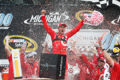 BROOKLYN, MI - AUGUST 28: Kyle Larson, driver of the #42 Target Chevrolet, celebrates in victory lane after winning the NASCAR Sprint Cup Series Pure Michigan 400 at Michigan International Speedway on August 28, 2016 in Brooklyn, Michigan. (Photo by Brian Lawdermilk/NASCAR via Getty Images)