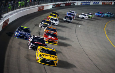 RICHMOND, VA - SEPTEMBER 10: Kyle Busch, driver of the #18 M&M's 75th Anniversary Toyota, leads a pack of cars during the NASCAR Sprint Cup Series Federated Auto Parts 400 at Richmond International Raceway on September 10, 2016 in Richmond, Virginia. (Photo by Chris Graythen/NASCAR via Getty Images)