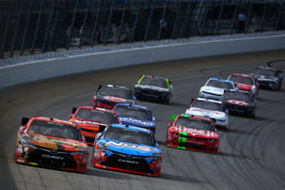 JOLIET, IL - SEPTEMBER 17: Kyle Busch, driver of the #18 NOS Energy Drink Toyota, and Daniel Suarez, driver of the #19 ARRIS/TMNT Michelangelo Toyota, lead a pack of cars during the NASCAR XFINITY Series Drive for Safety 300 at Chicagoland Speedway on September 17, 2016 in Joliet, Illinois. (Photo by Sarah Crabill/Getty Images)