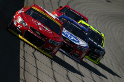 JOLIET, IL - SEPTEMBER 18: Kyle Larson, driver of the #42 Coke Chevrolet, leads a pack of cars during the NASCAR Sprint Cup Series Teenage Mutant Ninja Turtles 400 at Chicagoland Speedway on September 18, 2016 in Joliet, Illinois. (Photo by Sean Gardner/Getty Images)