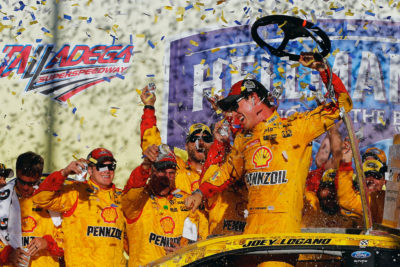 TALLADEGA, AL - OCTOBER 23: Joey Logano, driver of the #22 Shell Pennzoil Ford, celebrates in Victory Lane after winning the NASCAR Sprint Cup Series Hellmann's 500 at Talladega Superspeedway on October 23, 2016 in Talladega, Alabama. (Photo by Jonathan Ferrey/NASCAR via Getty Images)