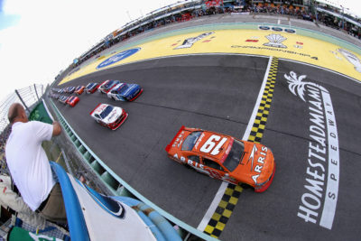 HOMESTEAD, FL - NOVEMBER 19: Daniel Suarez, driver of the #19 ARRIS Toyota, leads the field past the green flag to start the NASCAR XFINITY Series Ford EcoBoost 300 at Homestead-Miami Speedway on November 19, 2016 in Homestead, Florida. (Photo by Sean Gardner/NASCAR via Getty Images)