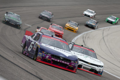FORT WORTH, TX - NOVEMBER 05: Darrell Wallace Jr, driver of the #6 Leidos Ford, leads a pack of cars during the NASCAR XFINITY Series O'Reilly Auto Parts Challenge at Texas Motor Speedway on November 5, 2016 in Fort Worth, Texas. (Photo by Brian Lawdermilk/Getty Images)
