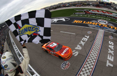 FORT WORTH, TX - NOVEMBER 05: Kyle Larson, driver of the #42 ENEOS Chevrolet, takes the checkered flag to win the NASCAR XFINITY Series O'Reilly Auto Parts Challenge at Texas Motor Speedway on November 5, 2016 in Fort Worth, Texas. (Photo by Sean Gardner/NASCAR via Getty Images)